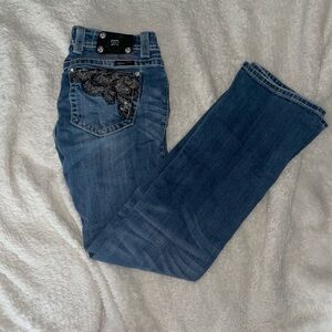 blue w/ black and gold sparkles, little distressed, in good condition